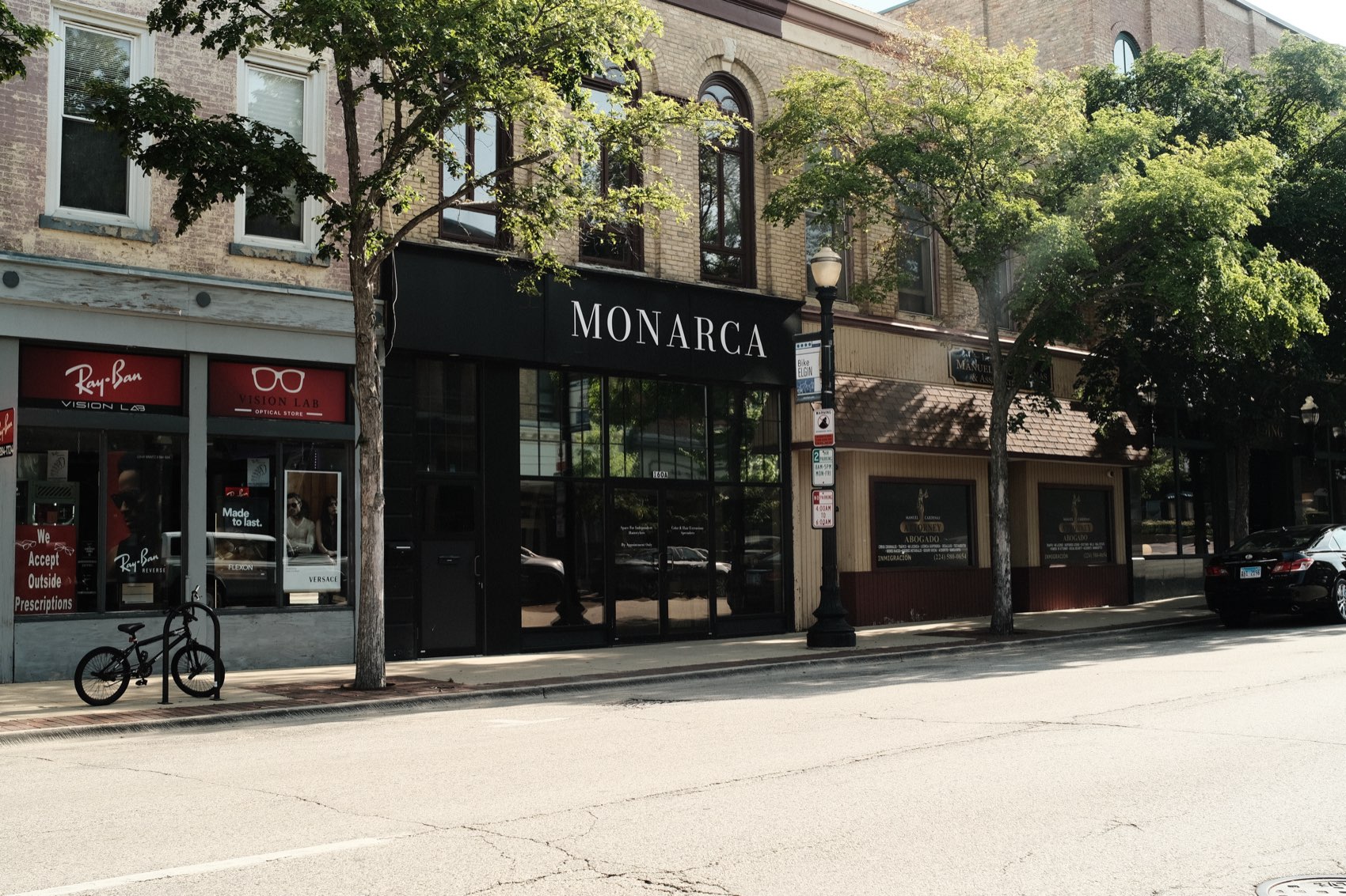 Monarca Salon Space storefront on the street in Elgin, Illinois